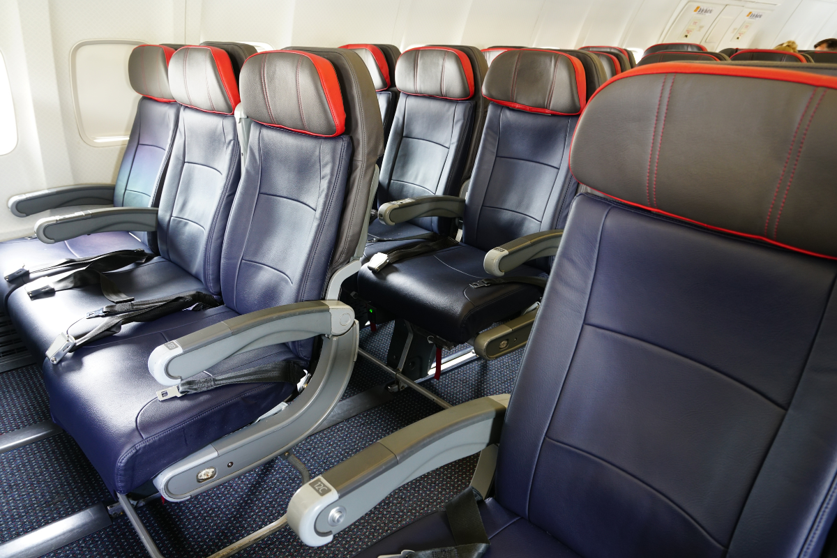 American Airlines Insists That Passengers Slapped With an Involuntary Downgrade Are Only Entitled to a 40% Refund... But it's Changing its Rules Anyway specific real-world editoria