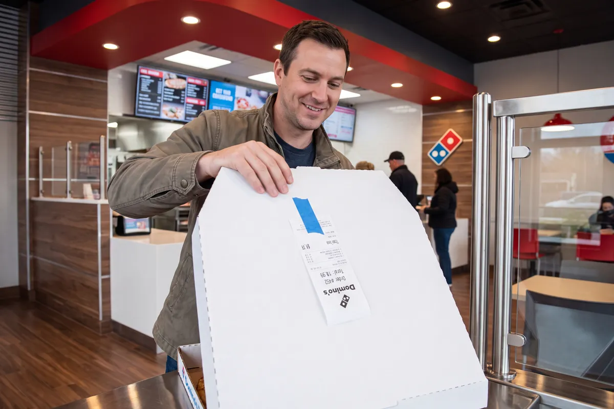 Domino’s San Francisco HSCO Fee Class Action Settlement specific real-world editorial scene