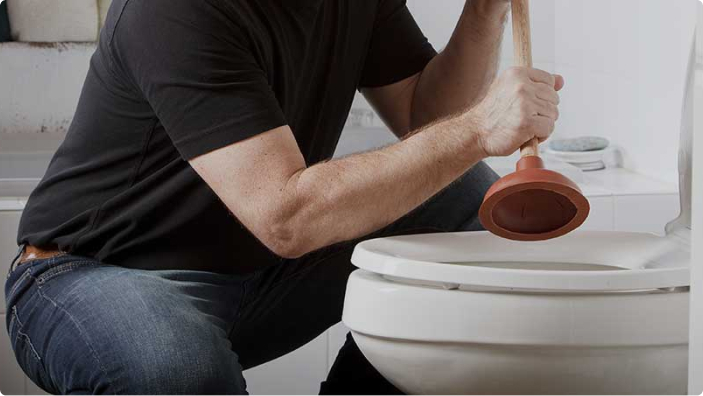 how to unclog a toilet without a plunger specific real-world editorial scene